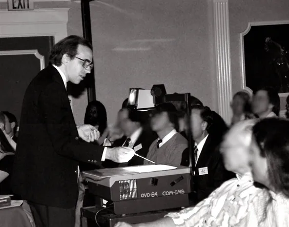 Cofounder Eric Drexler speaking at an early conference