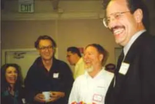Natasha Vita More, Norm Hardy, Fred Moulton, and speaker Greg Burch at a 1990s Senior Gathering