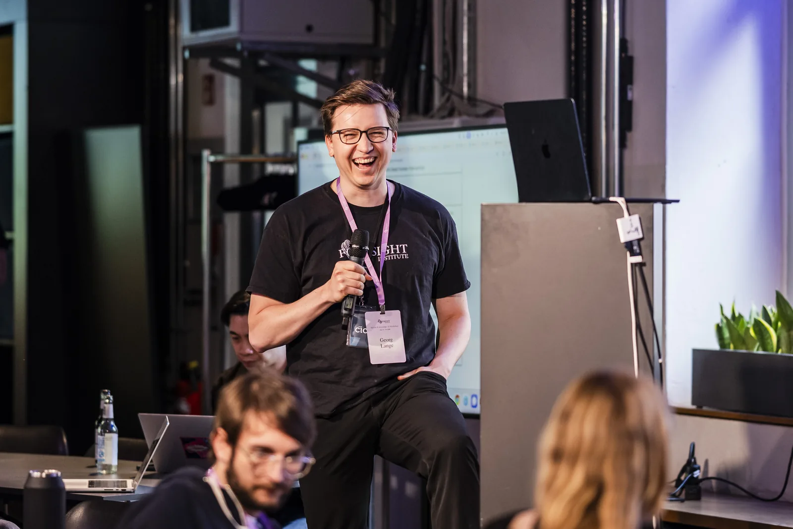 A speaker on stage