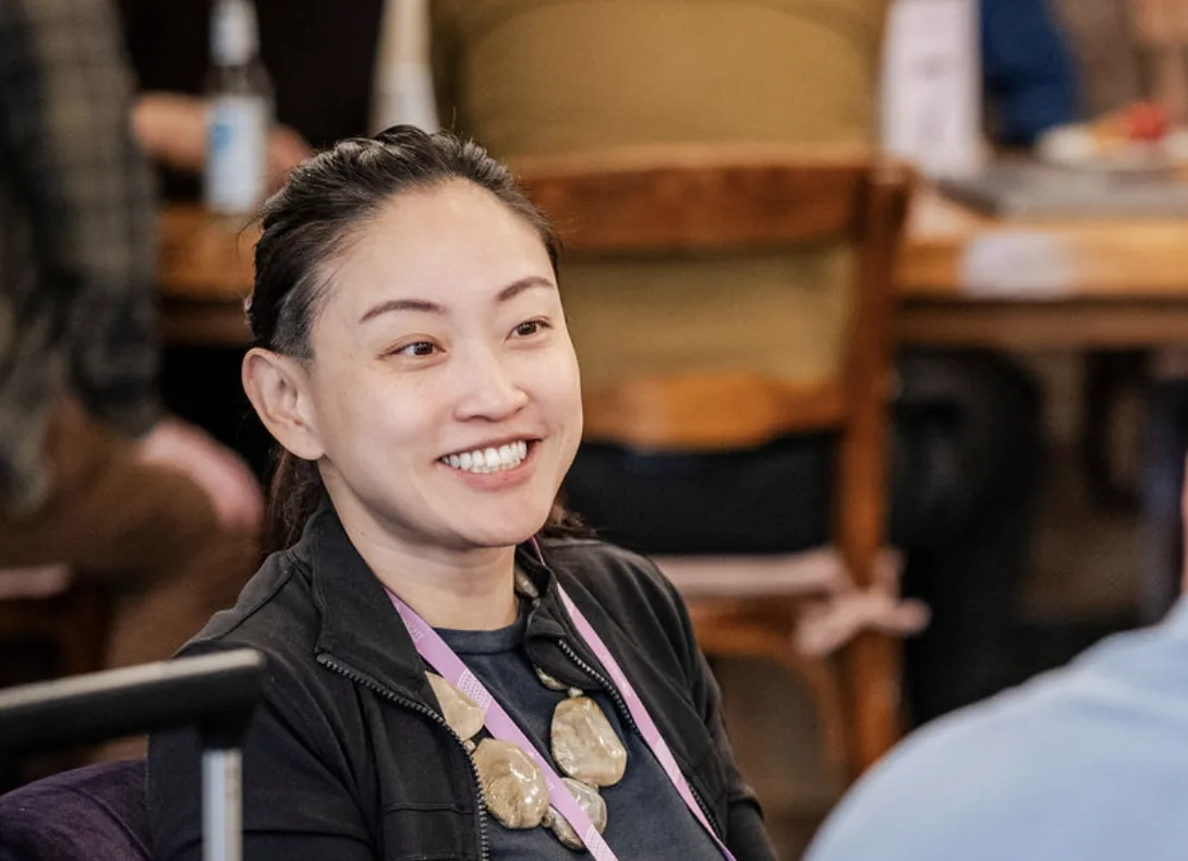 A smiling workshop participant